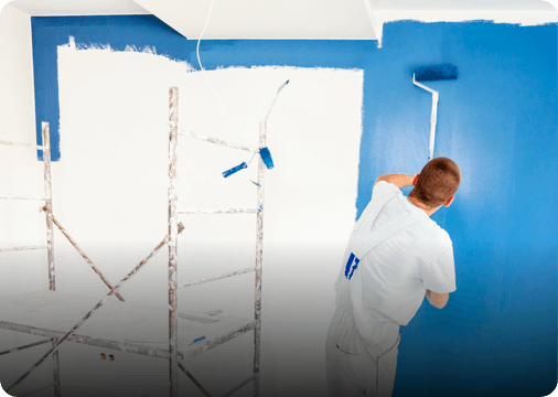 A person paiting walls