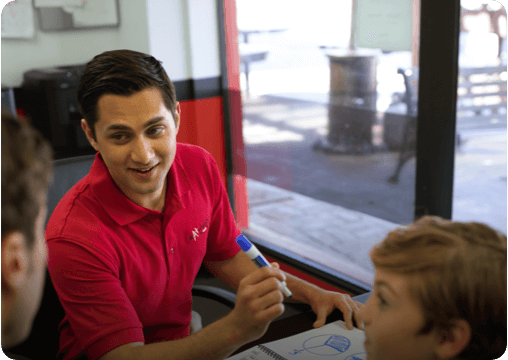 a young man from a franchise in a red outfit